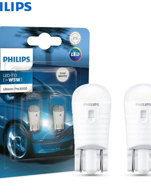Load image into Gallery viewer, Revolight Philips LED T10 W5W Ultinon Pro3000 6000K White Turn Signal Lamps Car Interior Light Number Plate Door Bulbs 11961U30CWB2, 2pcs
