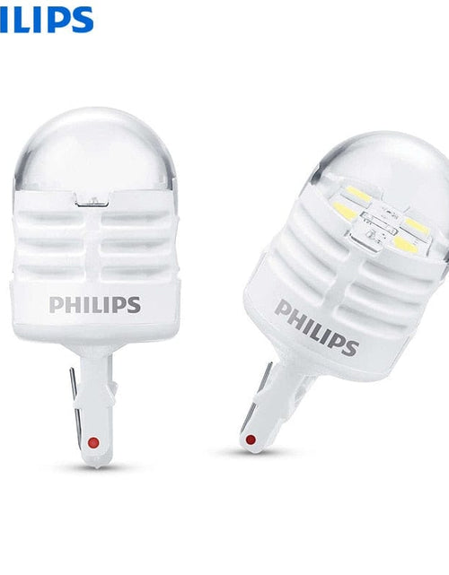 Load image into Gallery viewer, Revolight Philips LED Ultinon Pro3000 W21W T20 12V 6000K White Turn Signal Lamps Car Reverse Bulbs Indlcator Light 7440 11065U30CWB2, 2pcs
