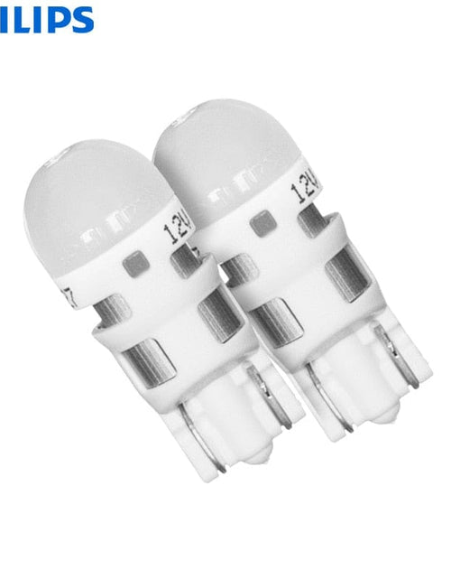 Load image into Gallery viewer, Revolight Philips Ultinon LED 4000K W5W T10 Warm White Auto Interior Bulbs Turn Signals LED Door Reading Lamps W2.1x9.5d 11961ULW4X2, 2pcs
